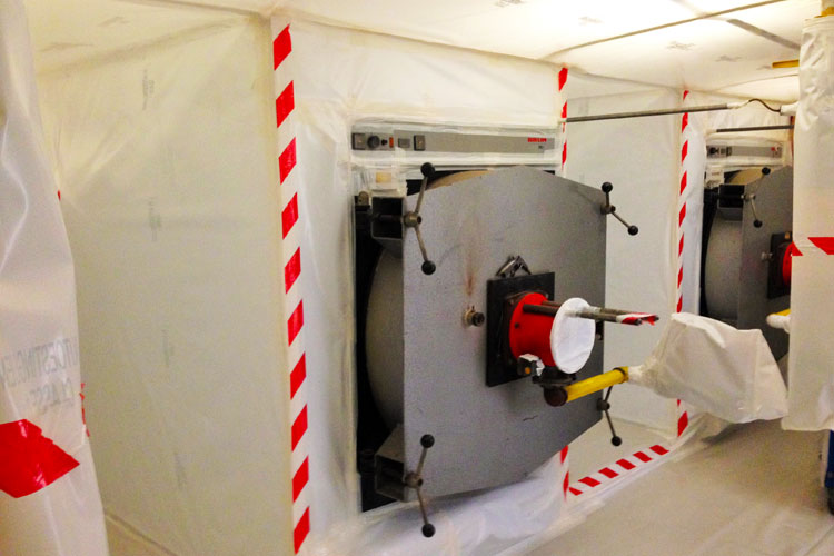 ASBESTOS REMEDIATION IN A CONFINED AREA